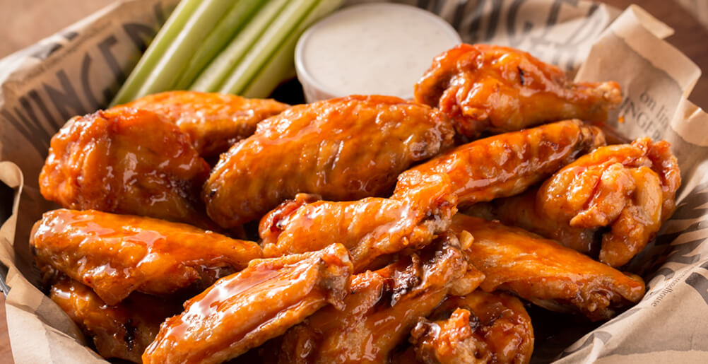 Named Best Wings in America! They’re fresh and juicy, with a mouthwatering variety of Signature Sauces.